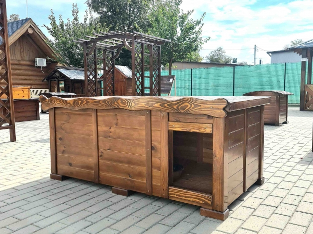 A booth with a wooden roof