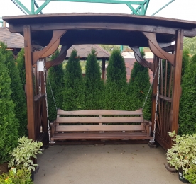 Swing with a flower bed